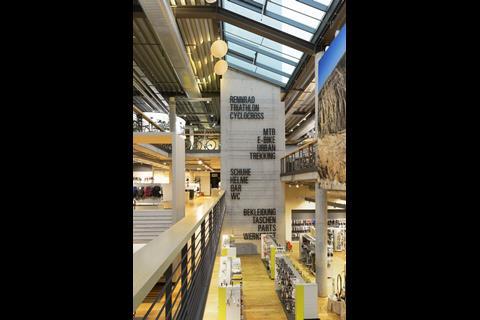 The open-plan layout allows visitors to stand on the store’s upper levels and peer down at the rest of the interior